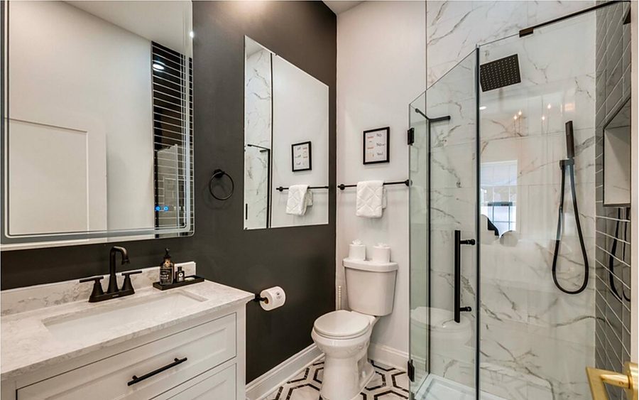 Moody Black & Marble Bath — Bathrooms by DFC Home Improvement