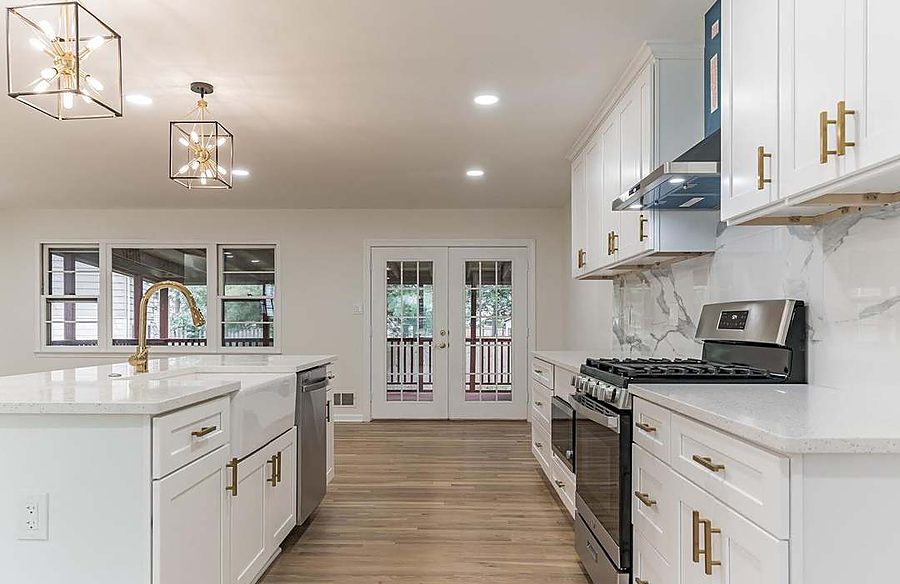 Open-Concept White Kitchen — Kitchens by DFC Home Improvement