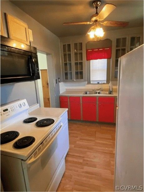 Two-Tone Galley Kitchen — before renovation by DFC Home Improvement